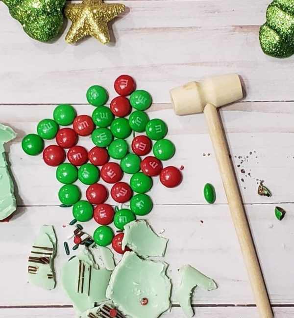 Green candy smash bombs with wooden mallet